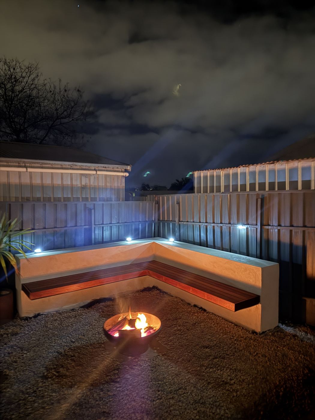 Outdoor firepit and bench seating